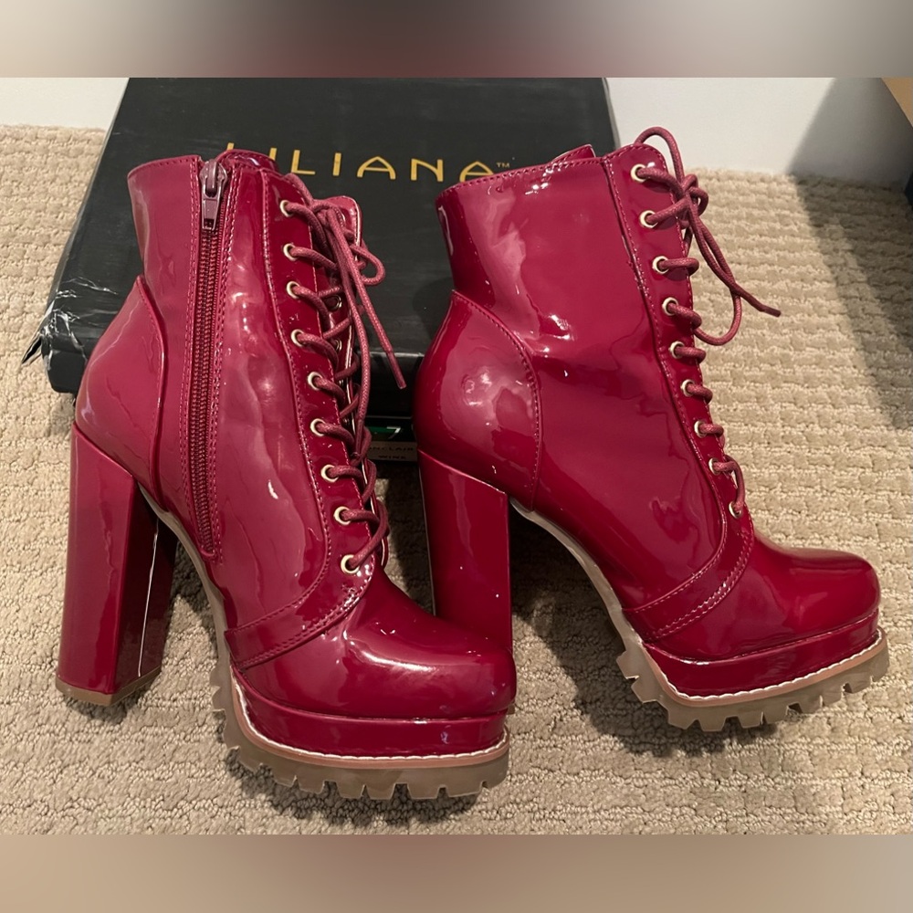 Never worn burgundy colored  platform patent boots. Perfect for fall!